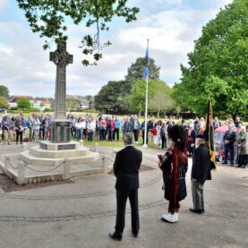 New Milton residents assemble around the War Memorial to remember VE80