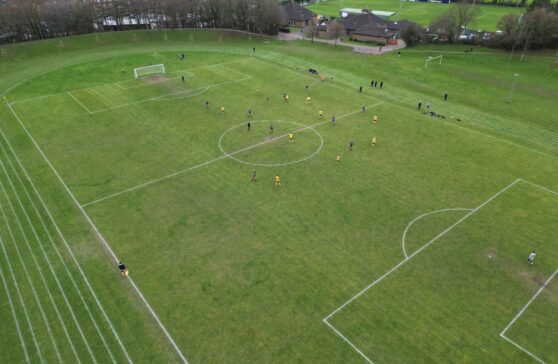 Drone image of football match at Fawcetts Field