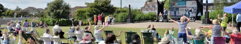 Residents enjoying an afternoon of music on the Recreation Ground