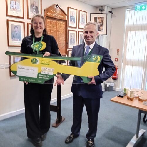 New Milton Mayor presents cheque to Hampshire and Isle of Wight Air Ambulance